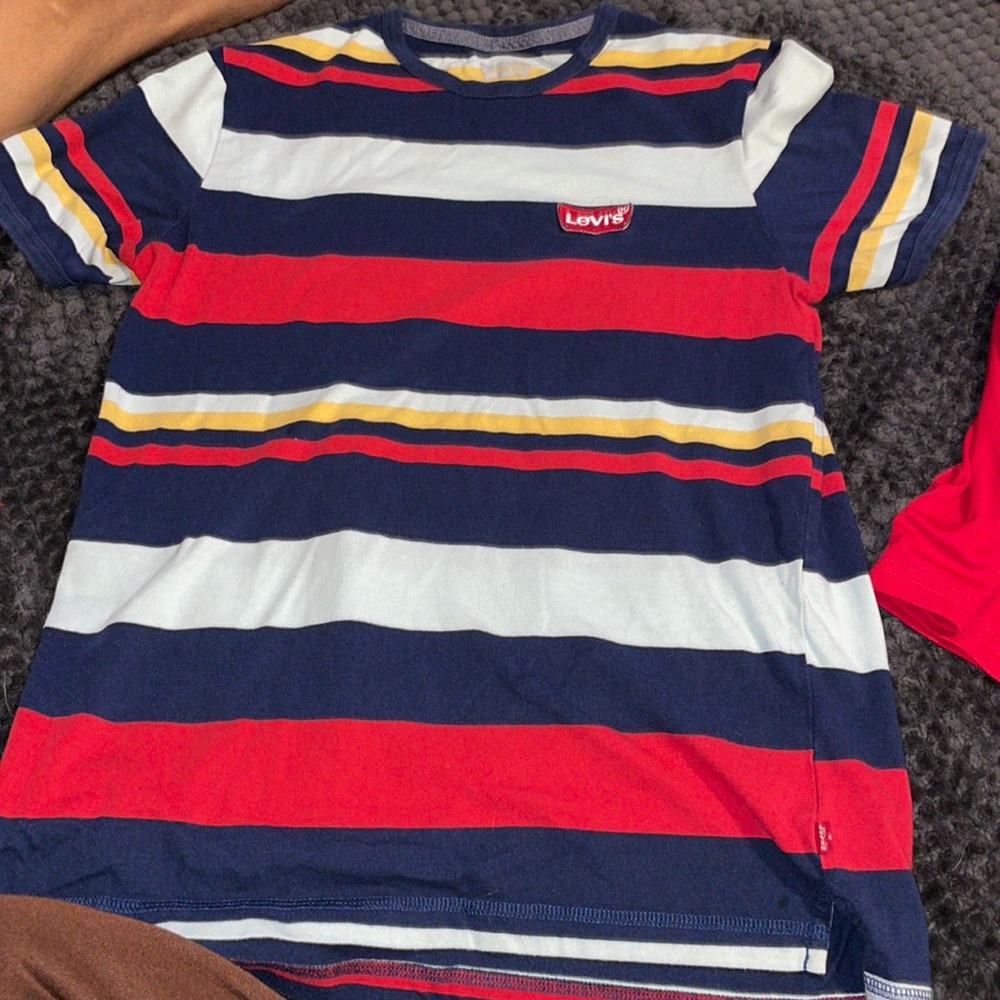 Mix of colors , nice shirt for a formal event or just casual wear